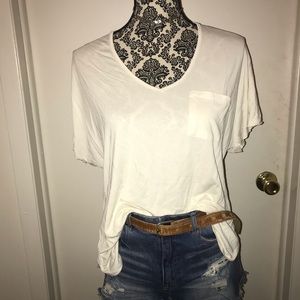 White pocket v neck tee shirt.